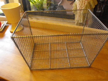 vintage basket with chicken wire- DIyscoop.com