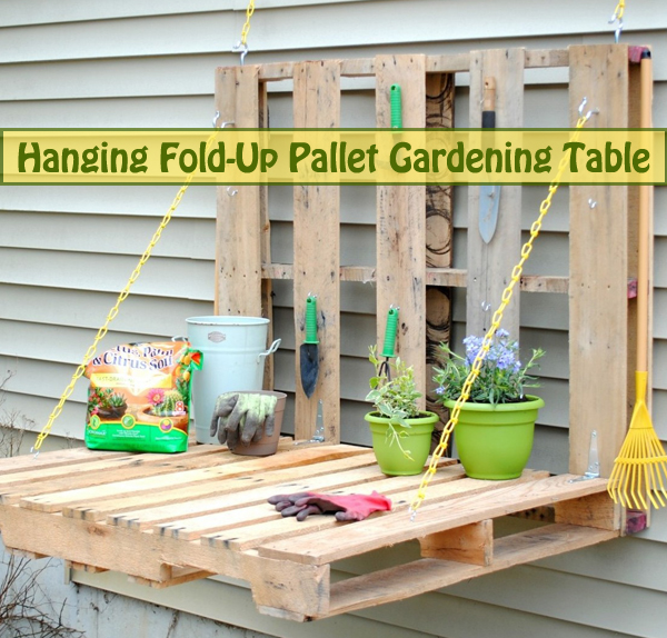hanging fold up pallet gardening table- DIYscoop.com